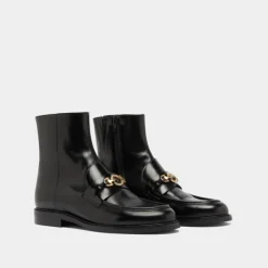 Boots à mors dorés
