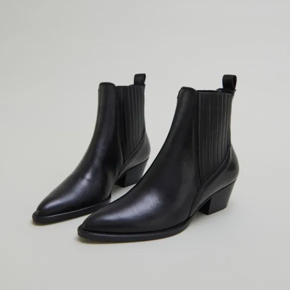 Boots à petits talons biseautés et élast...