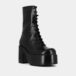 Boots à plateformes et lacets