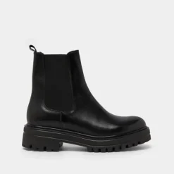 Boots à semelles crantées et élastiques