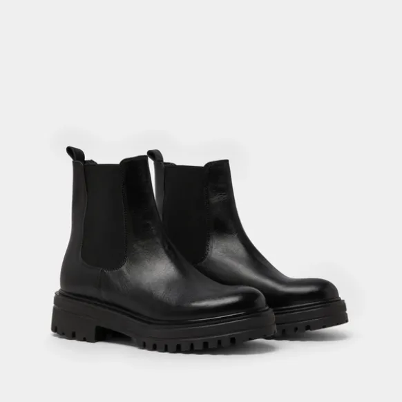 Boots à semelles crantées et élastiques