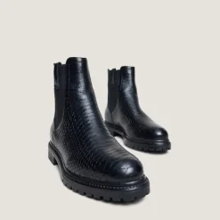 Boots à semelles crantées et élastiques