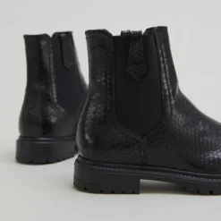 Boots à semelles crantées et élastiques