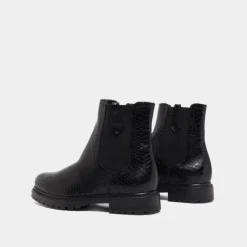 Boots à semelles crantées et élastiques