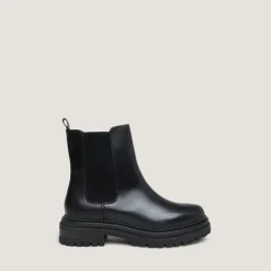 Boots à semelles crantées et élastiqu...