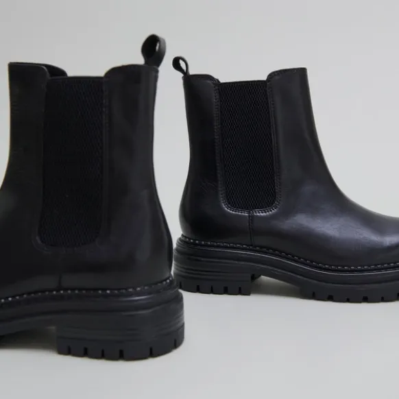 Boots à semelles crantées et élastiqu...