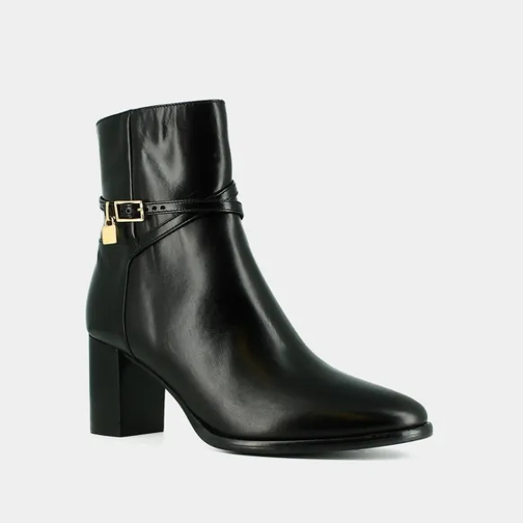 Boots à talons haut et charms dorés