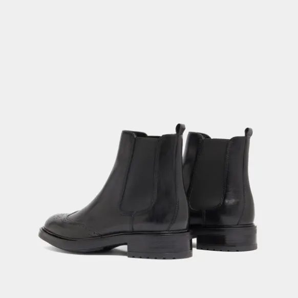 Boots basses à élastiques et détails ajourés