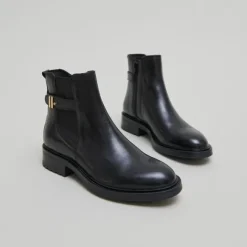Boots basses à talons crantés