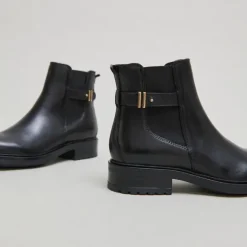 Boots basses à talons crantés