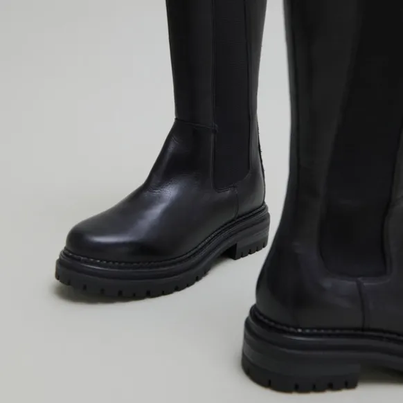 Bottes à bouts ronds et semelles crantée...