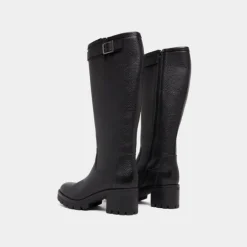 Bottes à semelles crantées et boucles