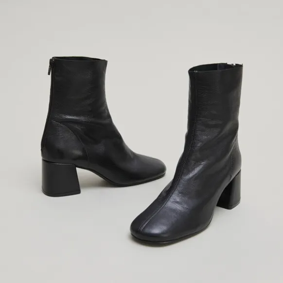 Bottines à fermetures éclairs arrières