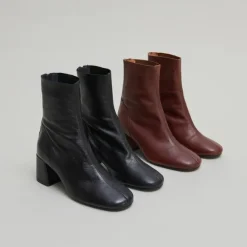 Bottines à fermetures éclairs arrières