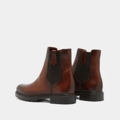 Bottines à semelles crantées et élastiques
