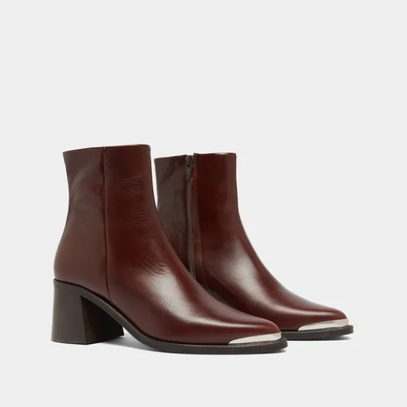 Bottines à talon et embout doré
