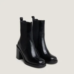 Bottines à talons débordants