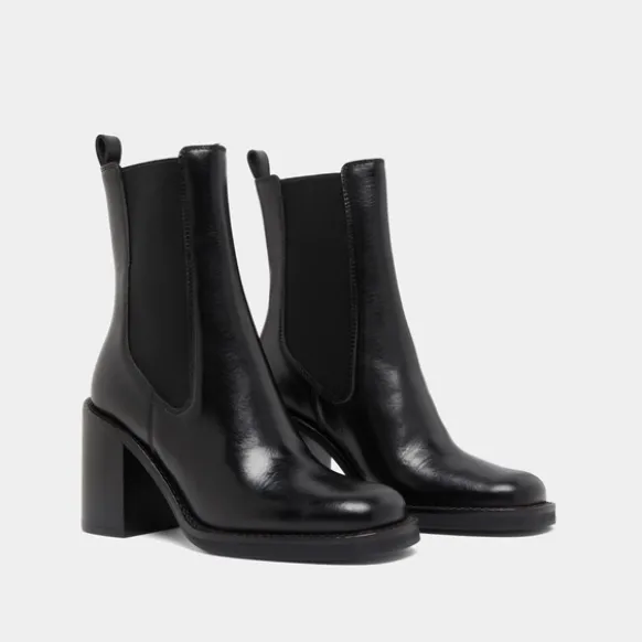 Bottines à talons débordants