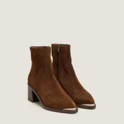 Bottines à talons et embouts dorés