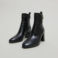 Bottines détaillées de boucles