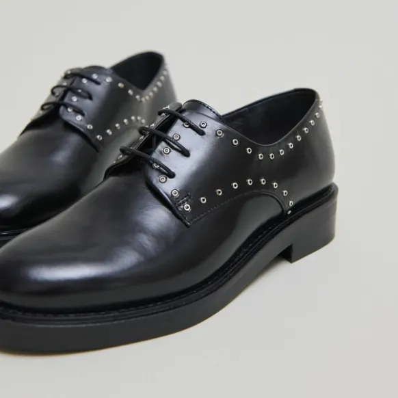 Derbies à détails argentés