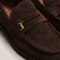 Mocassins à bouts ronds et monogrammes