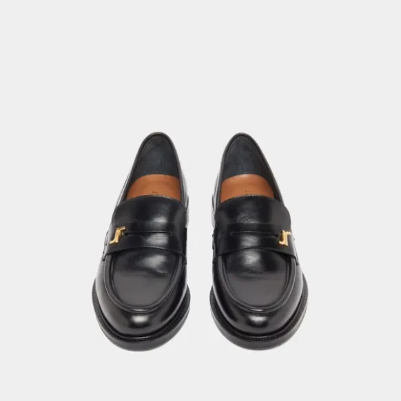 Mocassins à bouts ronds et monogrammes