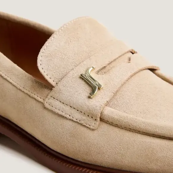 Mocassins à bouts ronds et monogrammes