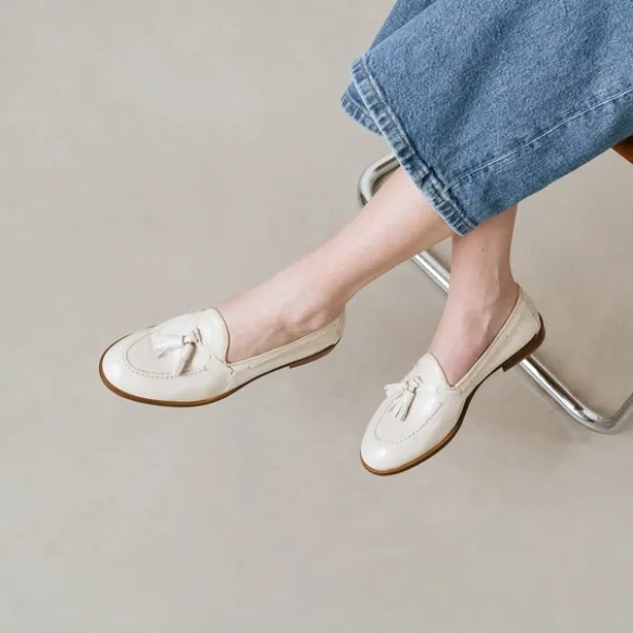 Mocassins à bouts ronds et pompons