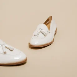Mocassins à bouts ronds et pompons