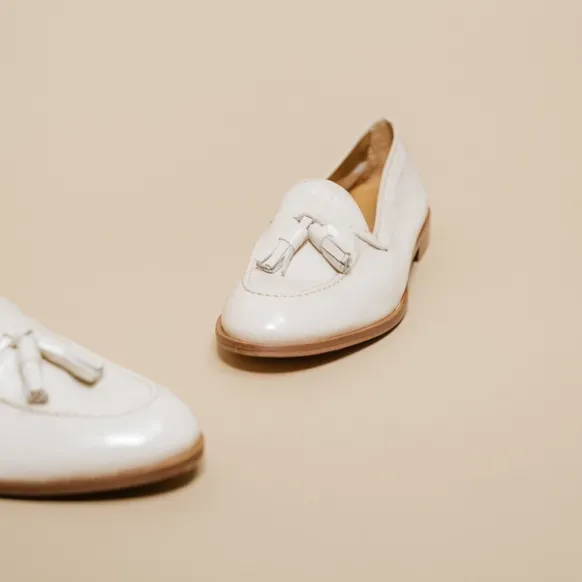 Mocassins à bouts ronds et pompons