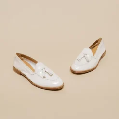 Mocassins à bouts ronds et pompons