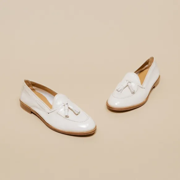 Mocassins à bouts ronds et pompons