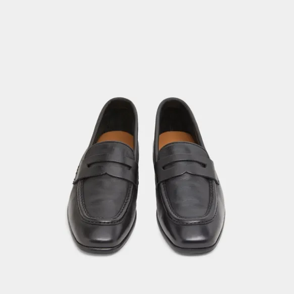 Mocassins à talons plats et bouts arrond...