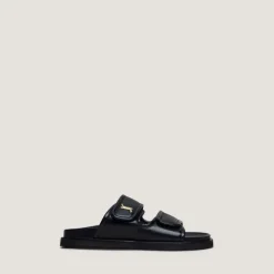 Mules à monogrammes