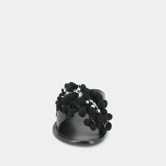 Mules à pompons et perles